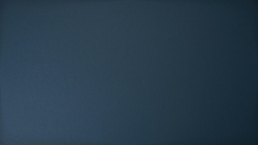 Home Dark blue textured background perfect for design projects and wallpapers.